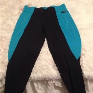 Teal and black horse back riding pants